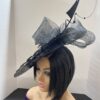 "Vondee" Black Guipure Lace Saucer Hatinator with Acrylic base.