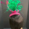 Zylah Bloom - Hot Pink Lily Fascinator: Green Feather Statement Hat - ByAlpha Couture.