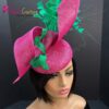 Zylah Bloom - Hot Pink Lily Fascinator: Green Feather Statement Hat - ByAlpha Couture.