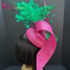 Zylah Bloom - Hot Pink Lily Fascinator: Green Feather Statement Hat - ByAlpha Couture.