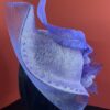 Ebezina Lilac Sinamay Wave Fascinator. Wedding Guest Headpiece