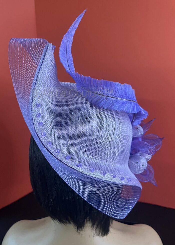 Ebezina Lilac Sinamay Wave Fascinator. Wedding Guest Headpiece