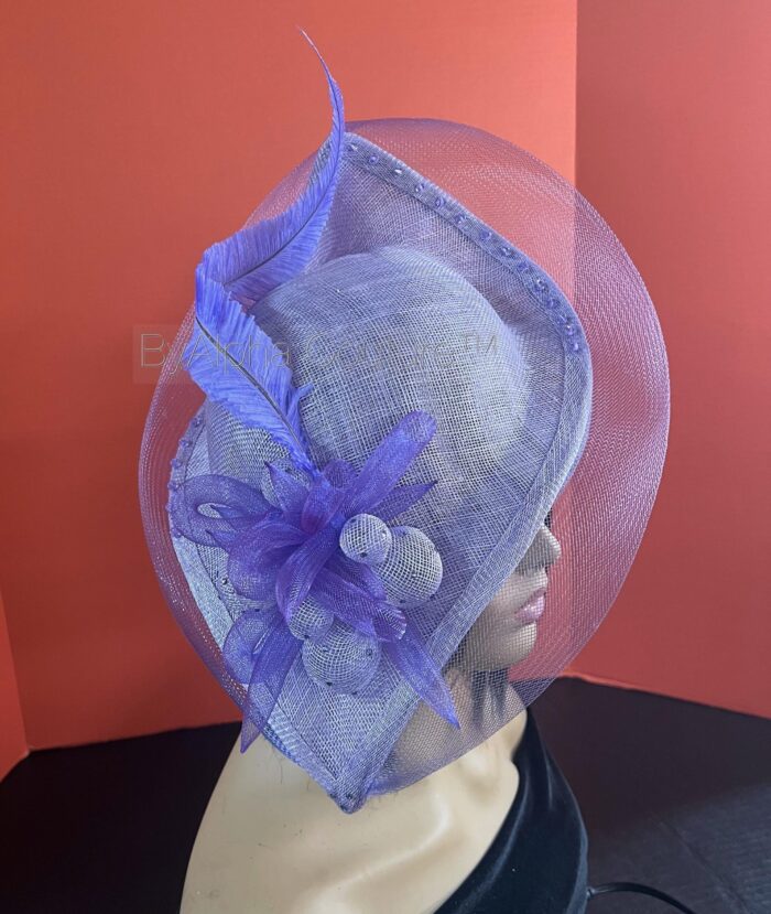 Ebezina Lilac Sinamay Wave Fascinator. Wedding Guest Headpiece