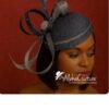 Celestine - Blue Sinamay Fascinator: Sculpted Swirls, Crystal Brooch - Derby Hat