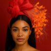 Zorana Red.  Red Knot Fascinator: Silk Abaca Headband with Orange Feathers.